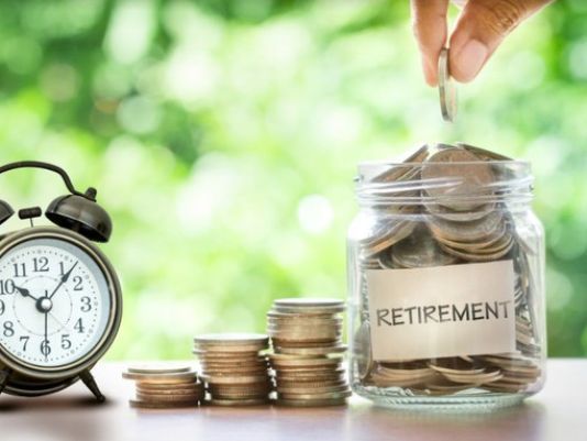 retirement-savings-jar-full-of-coins-and-alarm-clock_large